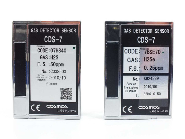 Cosmos CDS-7 gas detector sensor front labels — left: code 07HS40 H2S 50ppm; right: code 7BSE70 H2Se 0.25ppm