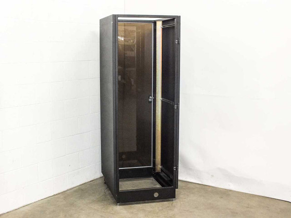 Industrial rackmount enclosure cabinet – front three-quarter view with smoked glass door open, showing interior rack space and casters