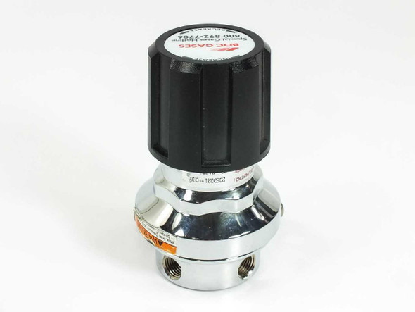 CONCOA 2053021-000 Series 205 regulator rear view showing chrome body, model label, and outlet port fittings