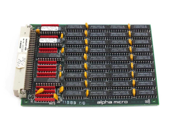 Alpha Micro AM-715 4MB Memory Expansion Board REV B — top component side showing rows of DIP DRAM chips and red DIP switches