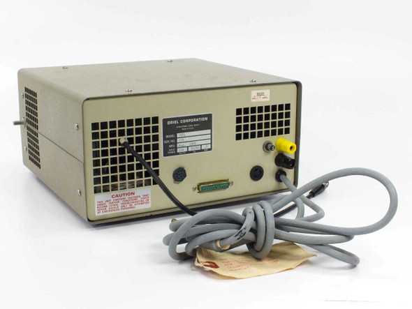 Oriel 7081 Pyroelectric Detector System — rear panel view showing DB25 connector, DIN connectors, BNC output, ventilation grille, and attached cables including gray signal cable