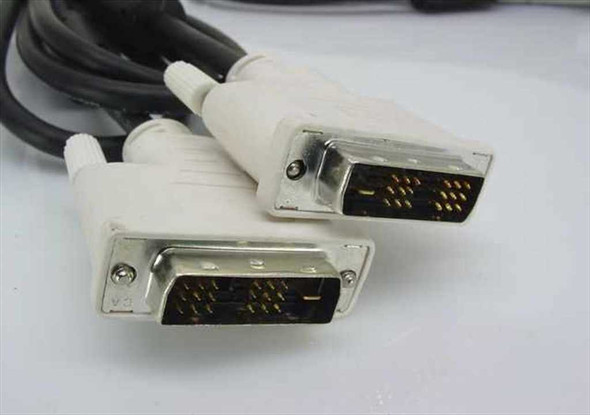 Close-up of two DVI-D 18-pin male connectors side by side showing gold-plated pin layout and white plastic housings