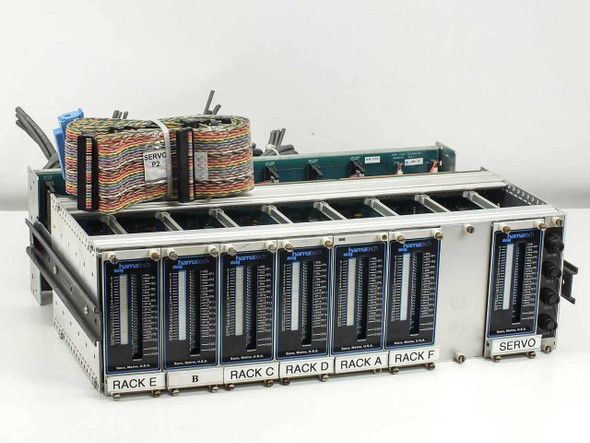 Steag Hamatech First Light servo motor I/O card chassis front view showing Rack E, B, C, D, A, F and Servo slots with cards installed and ribbon harness on top