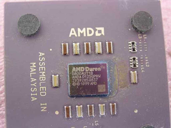 AMD Duron D800AUT1B close-up of processor die label showing model number and 1999 date code
