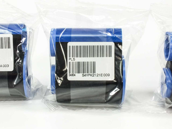 Close-up of Zebra PL5 black ribbon label showing model PL5, part number 04804, and lot code S4YPK2121E009