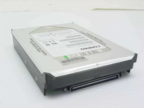 Compaq 313717-001 WDE9100 9.1GB 3.5-inch Wide Ultra SCSI-3 hard drive – angled front/top view showing Compaq label and 80-pin connector