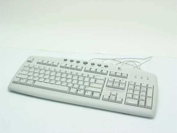Logitech Y-ST39 PS/2 Internet Keyboard 104-key full layout top view showing yellowed white plastic housing and internet hotkeys along the top