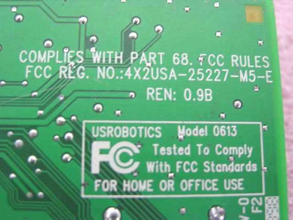 US Robotics Model 0613 PCB back label showing FCC Part 68 compliance, FCC Reg No. 4X2USA-25227-M5-E, and REN 0.9B