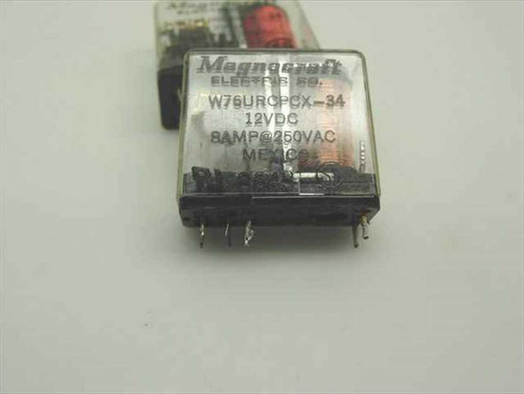 Magnocraft W76URCPCX-34 12VDC 8A 250VAC relay – close-up of label showing model number, voltage, and current rating printed on housing
