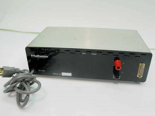 Matheson 8160 Mass Flow Meter rear panel showing 115 VAC power cord and D-sub output connector