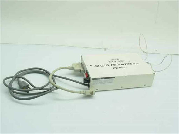 Omega Engineering WB-31 Analog ASCII Interface converter — front-left view with RS-232 DB-9 cable and AC power cord attached