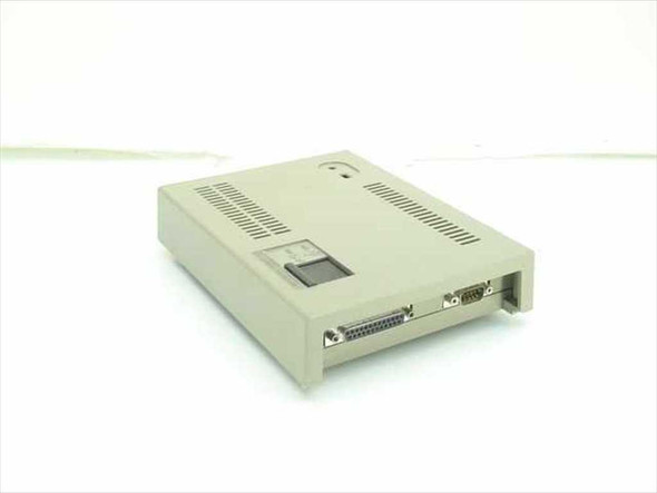 Lexmark 4033-001 Token Ring Print Server — front-left angled view showing beige desktop enclosure with ventilation slots and DB25 and DB9 ports on right side