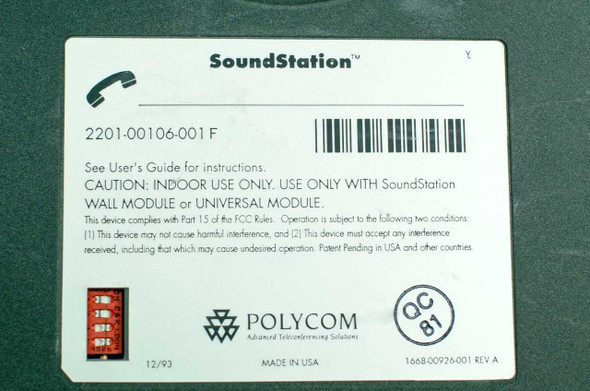 Polycom SoundStation 2201-00106-001 audio conference phone — top view showing triangular body with Polycom logo, speaker grille, and detached keypad module