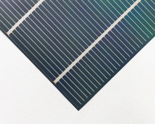 Close-up corner detail of Solopower SP3 CIGS solar cell showing thin-film layer and metallic grid lines