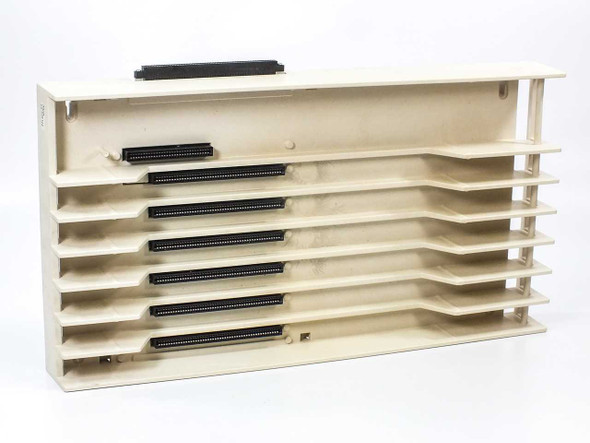 Lucent 403K Merlin Legend PBX expansion backplane front view showing 7 module slots with edge connectors