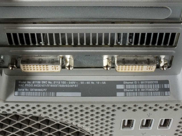 Apple Mac Pro A1186 rear panel label showing Model A1186 EMC 2113, serial number, MAC address, power spec 100-240V 50-60Hz, and two DVI ports from ATI X1900XT
