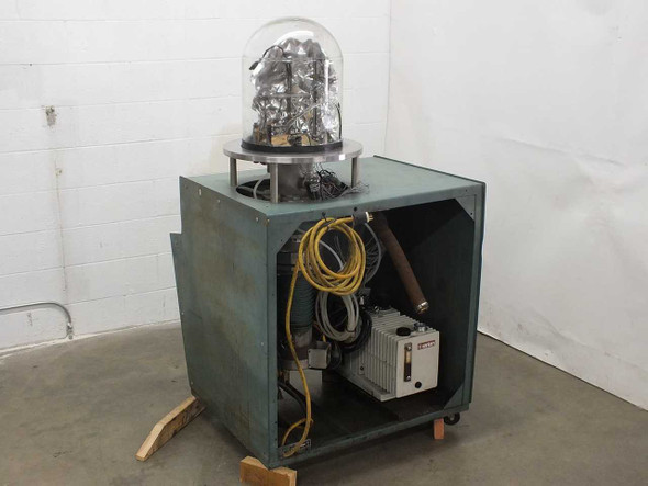 NRC 3114 Sputtering Chamber side view with cabinet open showing Varian SD-700 rotary vacuum pump, yellow power cable, and internal plumbing