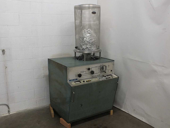 NRC 3114 Sputtering Chamber front view showing cracked glass bell jar mounted on base cabinet with front control panel