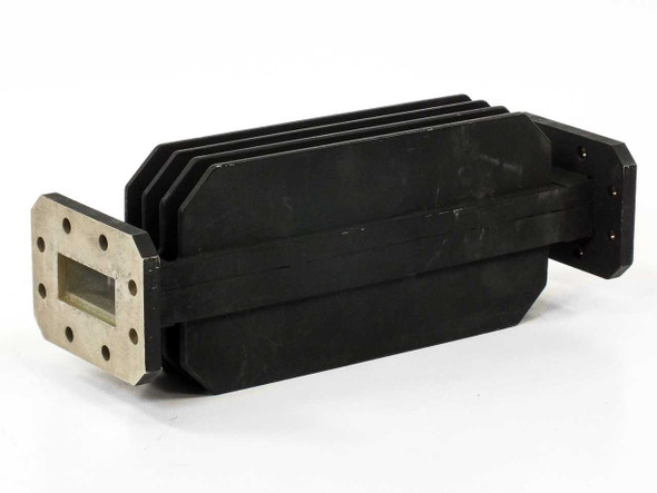 Varian F137CA6 WR-137 C-Band waveguide load – left-side three-quarter view showing full finned aluminum body