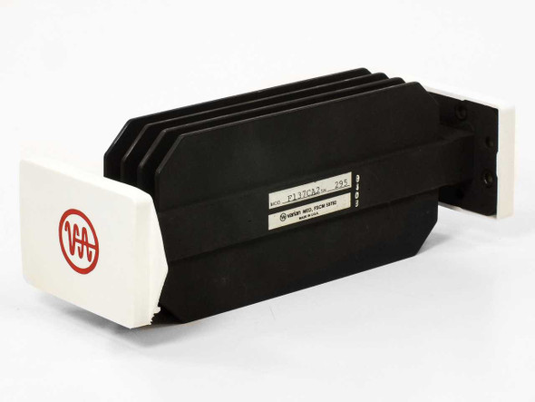 Varian F137CA2 WR-137 C-Band waveguide with fins — three-quarter front view showing black finned body and white flange ends with Varian logo