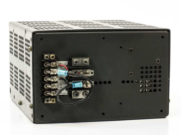 Lambda LXS-D-24 Regulated Power Supply – rear view showing screw terminal block output connections with wiring