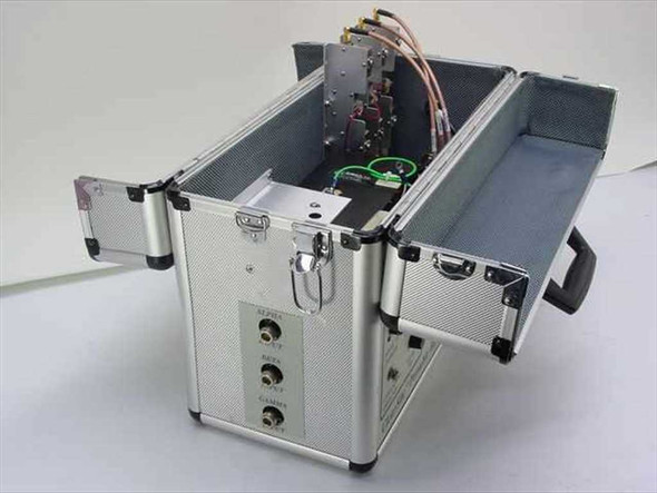 Portable Bypass Unit open case showing internal RF module assembly with wiring, circulators, and attenuator components