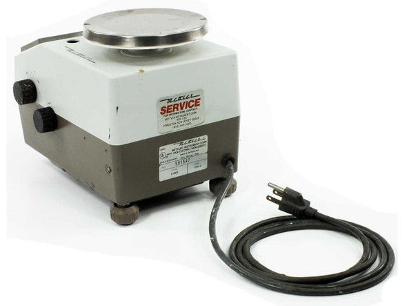 Mettler E2000 benchtop balance – left side view with power cord extended and Mettler Service label visible
