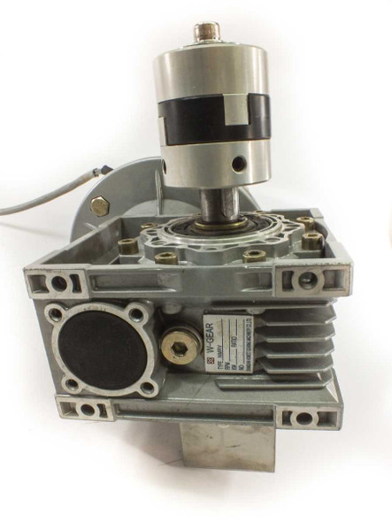 W-Gear NMRV worm gearbox side view showing rating plate label and output shaft with hollow bore flange face