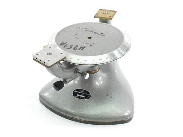 Griffin & George Ltd 6-inch rotary precision manual measuring stage — front three-quarter view showing divided circle table, vernier scale, cast base, and small bracket attachments