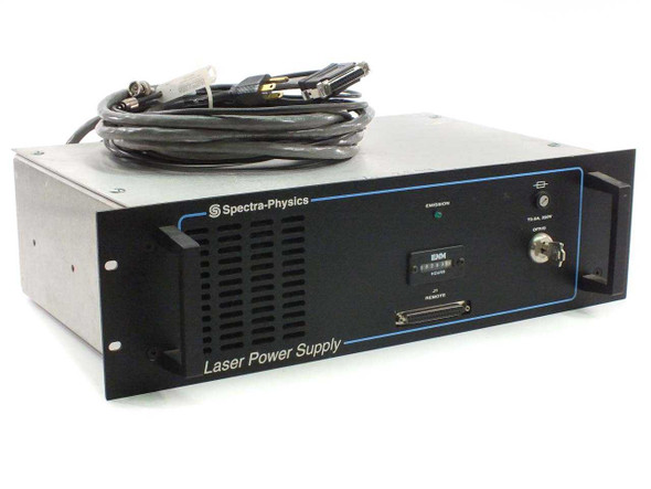 Spectra-Physics R2-740 Laser Power Supply front panel view showing Emission LED, ENM hour meter, J1 Remote D-sub connector, and included cable coiled on top