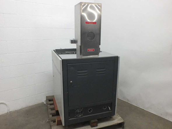 Electron Vision ElectronCure 30X – rear-left view showing stainless steel column with warning labels, ventilation grille, and bottom rear connections panel