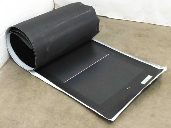 Xunlight XRS10-83 flexible amorphous solar panel partially unrolled showing black ETFE surface and white edge trim