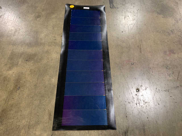 Xunlight XSS11-35 35W flexible amorphous solar panel laid flat on floor, front cell surface view