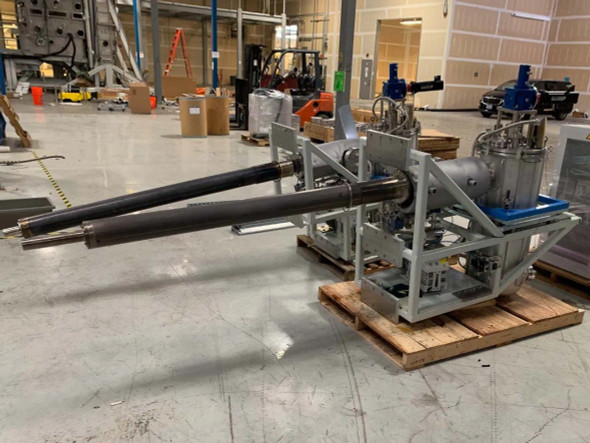 Riber Jet 40K selenium cracker front-right view showing full length of dual delivery tubes and stainless steel source body on gray frame