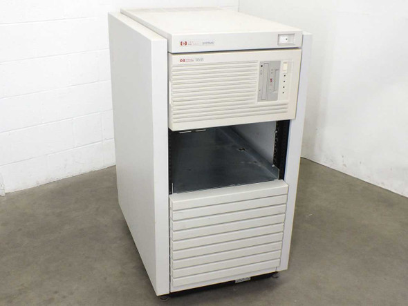HP 9000 E35 server in HP C2785A rack enclosure — three-quarter front view showing upper HP Systems bezel and lower server bay with open card cage area