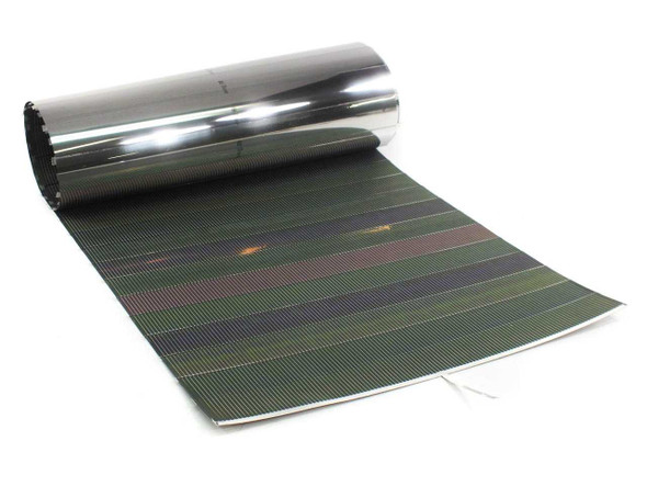 Solopower SP1 CIGS raw solar cell string partially unrolled showing flexible stainless steel substrate and CIGS cell striping