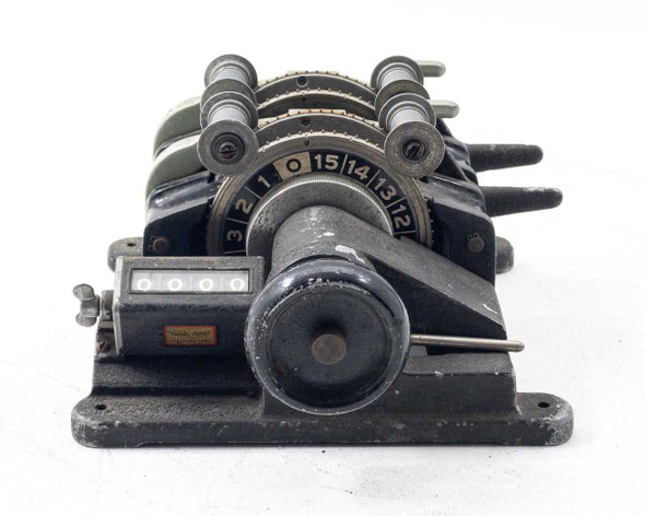 Moviola SYB film synchronizer – front view showing dual sprocket gangs, numbered frame-count dial, 4-digit Veeder-Root counter, and hand crank