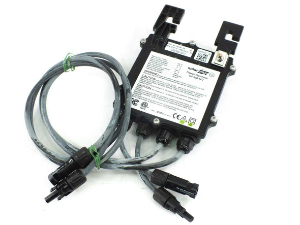 SolarEdge OP400-MV Power Optimizer top-down view showing SolarEdge branding label, OP400-MV model designation, MC4 input and output cables with weatherproof connectors, and regulatory certification markings