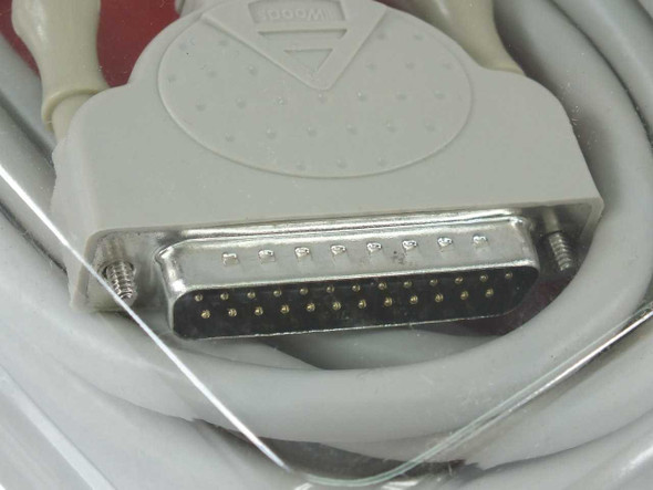 Close-up of DB25 male connector end on Woods 5984 25-pin switch box cable showing 25-pin configuration and thumb screws