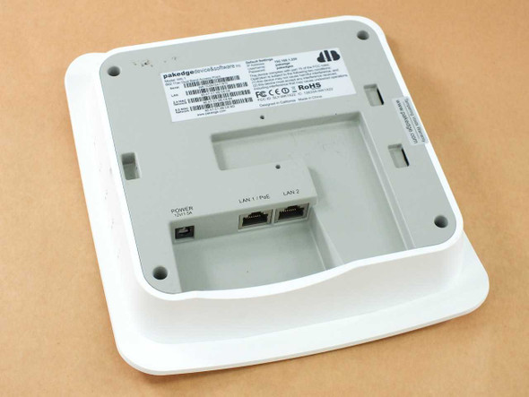 Pakedge WK-1 — bottom view showing mounting bracket, POWER port, LAN 1/PoE and LAN 2 ports, and regulatory label