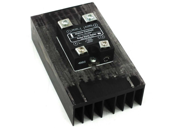 Watlow SSR-240-40G-DC1 Solid State Relay mounted on black aluminum heatsink — front angled view showing label and load terminals