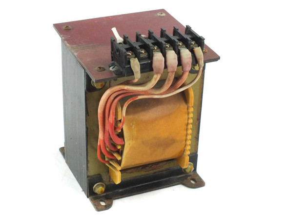 Open frame power transformer showing copper coil windings, multi-tap screw terminal block, and mounting feet — front-right angled view