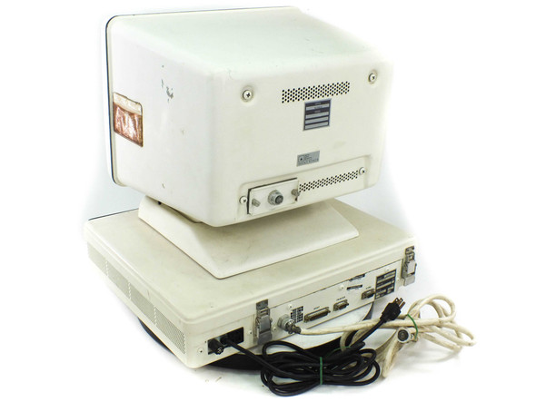 Delta Data Systems 8260AT computer and CRT monitor — rear three-quarter view showing rear panel ports and cabling