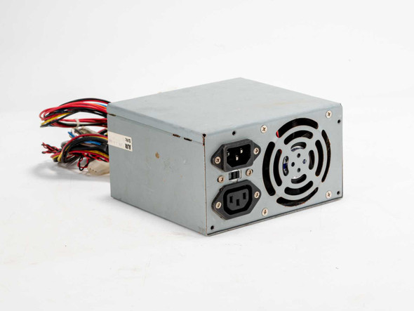 Dynapower 250W AT power supply — angled rear-left view showing IEC inlet, voltage selector, fan grille, and outgoing wiring harness