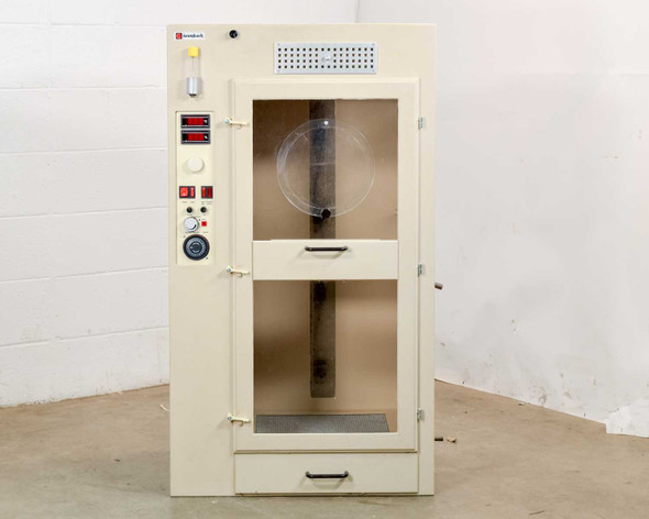 Grumbach Brutgeräte inter-hatch incubator front view, door slightly open, showing full cabinet profile with cream-colored enclosure and left-side control panel