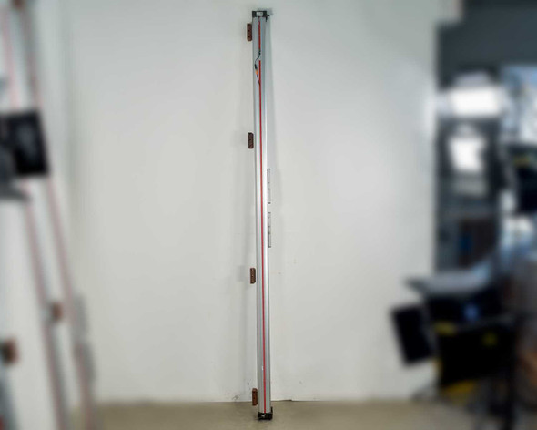 Parker Origa OSP-P50 pneumatic rodless cylinder full length view showing 2200mm stroke body with red sealing band stripe
