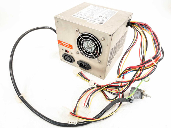 DTK Computer PTP-2001 200W AT switching power supply – full unit showing brushed metal enclosure and output wire harness with Molex connectors