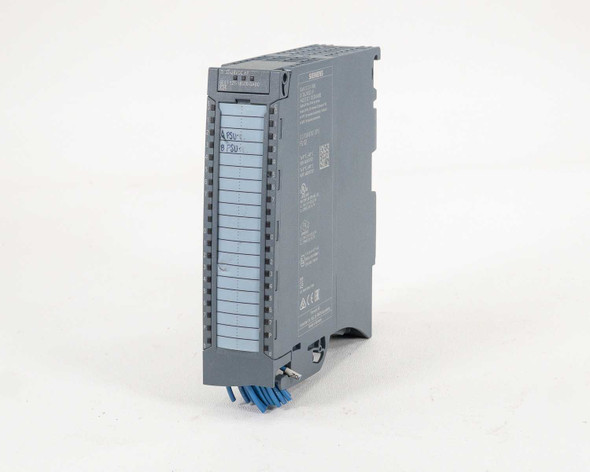 Siemens 6ES7521-1BL00-0AB0 S7-1500 digital input module – angled front-left view showing blue wiring connector and front label
