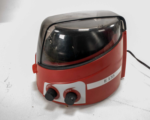 CAPP Rondo CR-68X microcentrifuge three-quarter rear view showing speed and time control dials and asset label