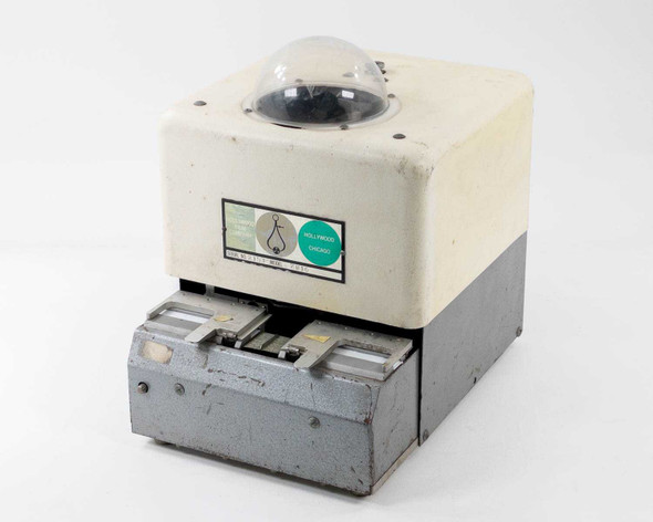 Hollywood Film Company 2816 16mm film splicer – three-quarter front view showing white upper housing with dome and gray lower splicing drawer